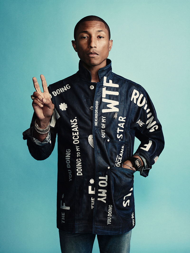 Sustainable Fashion - Pharrell Williams wears a denim jacket from the Raw for the Oceans collection, made from recycled plastic harvested from the sea