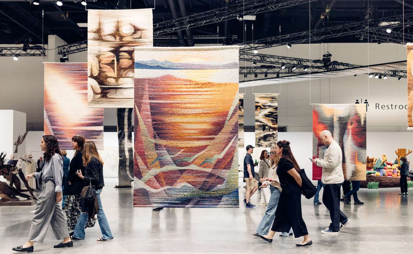 Guests browsing the art pieces at Art Basel Miami Beach.